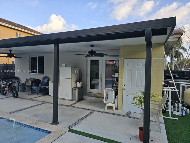 view of patio / terrace with french doors and ceiling fan