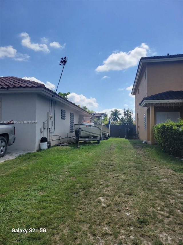 view of yard featuring fence