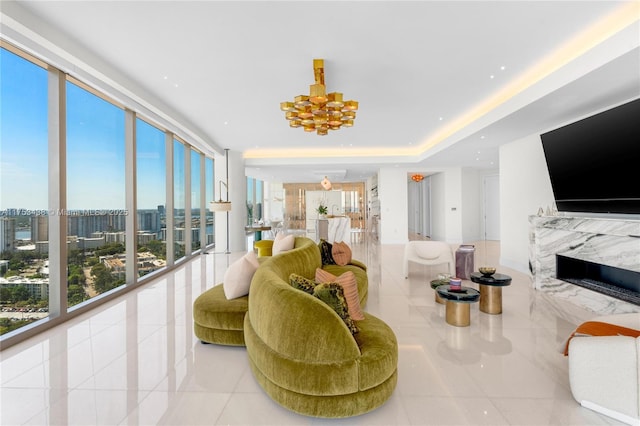 interior space featuring a view of city and a raised ceiling