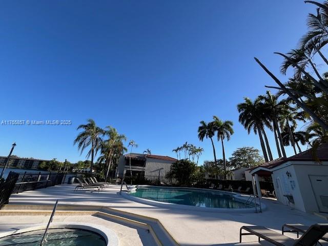 20220 NE 3rd Ct Unit 4, Miami, FL 33179 - community pool featuring a patio area and a hot tub