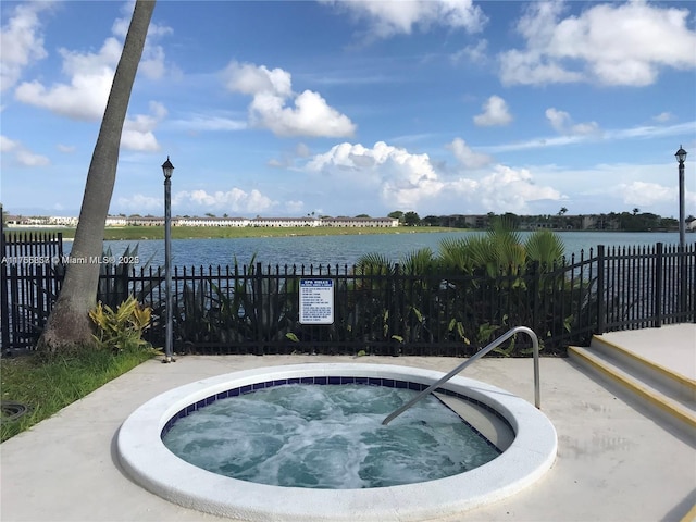 20220 NE 3rd Ct Unit 4, Miami, FL 33179 - view of pool with a water view and a hot tub