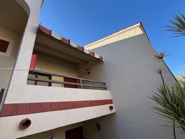 20220 NE 3rd Ct Unit 4, Miami, FL 33179 - exterior view of stucco siding