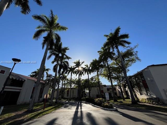 20220 NE 3rd Ct Unit 4, Miami, FL 33179 - view of asphalt street featuring a residential view and curbs