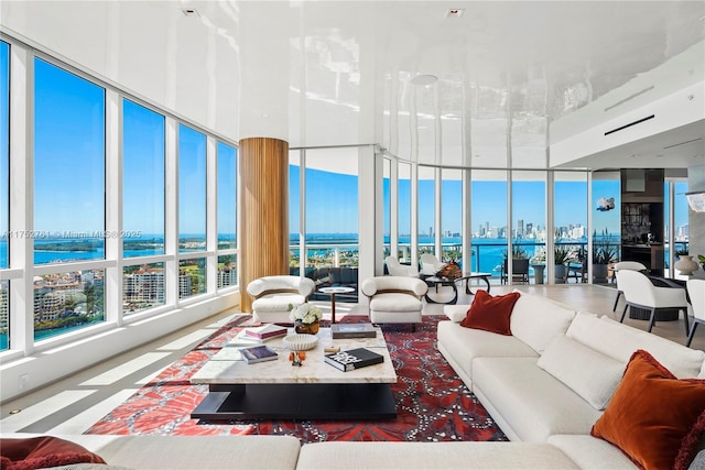 100 S Pointe Dr Unit 2803, Miami Beach, FL 33139 - living area featuring a wall of windows, a water view, and a view of city