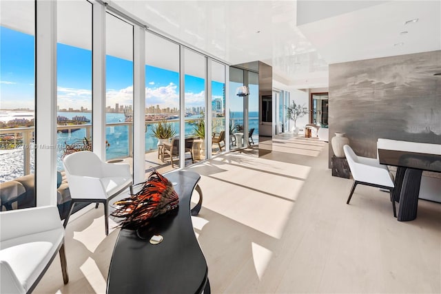 100 S Pointe Dr Unit 2803, Miami Beach, FL 33139 - living room with a water view and a wall of windows
