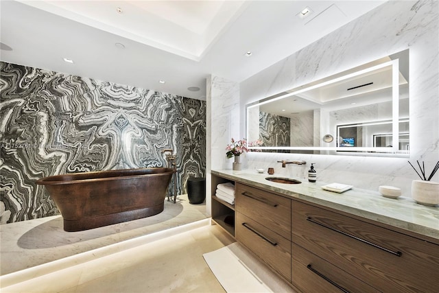 100 S Pointe Dr Unit 2803, Miami Beach, FL 33139 - bathroom featuring vanity, wallpapered walls, and a freestanding bath