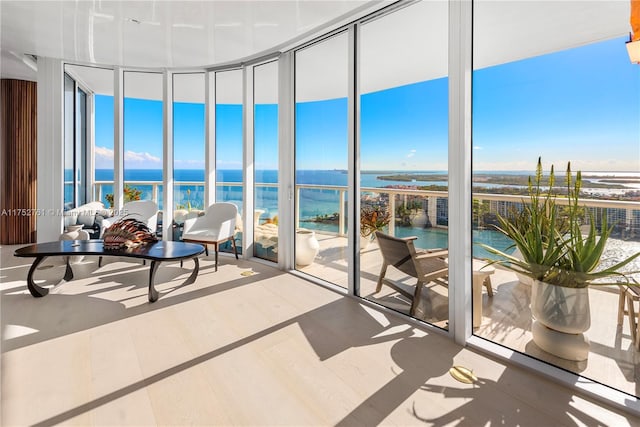 sunroom with a water view