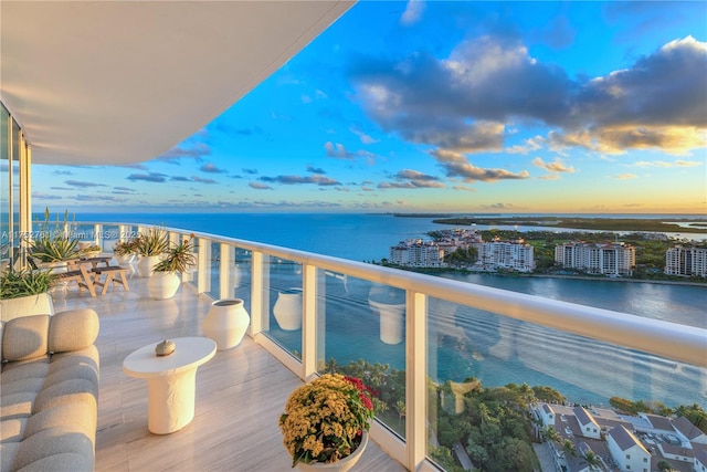 balcony at dusk with a water view