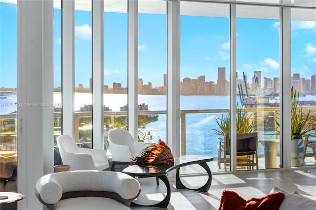 100 S Pointe Dr Unit 2803, Miami Beach, FL 33139 - sunroom featuring plenty of natural light, a skyline view, and a water view