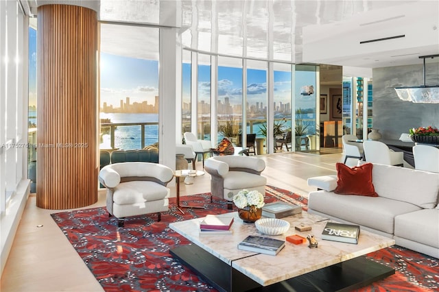 100 S Pointe Dr Unit 2803, Miami Beach, FL 33139 - living area with expansive windows and a view of skyline