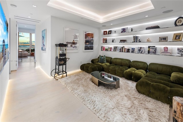 100 S Pointe Dr Unit 2803, Miami Beach, FL 33139 - living area with a tray ceiling, wood finished floors, recessed lighting, and baseboards
