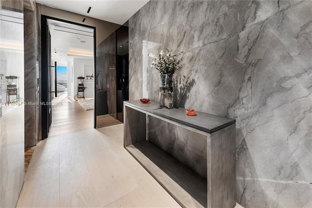 100 S Pointe Dr Unit 2803, Miami Beach, FL 33139 - hallway featuring light wood-style floors
