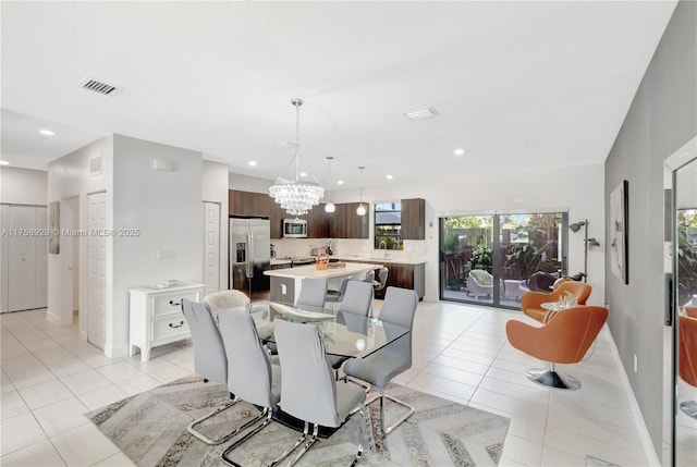 dining room featuring recessed lighting, visible vents, an inviting chandelier, and light tile patterned floors