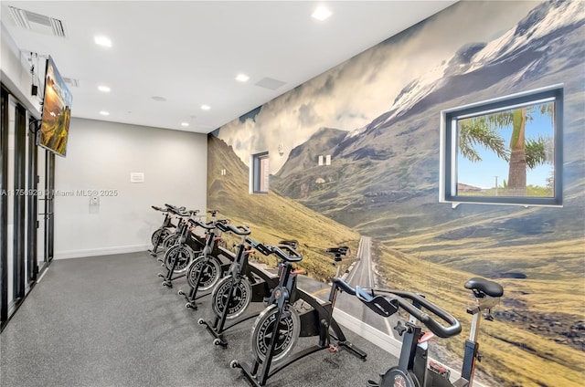 workout area with recessed lighting, visible vents, and baseboards