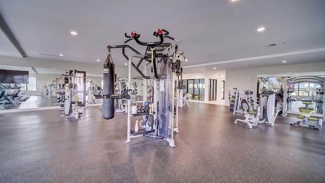 exercise room with recessed lighting