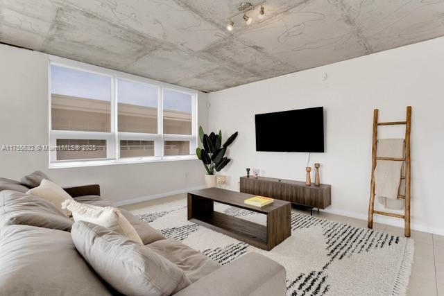 living room with baseboards