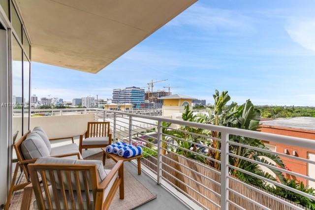 balcony featuring a view of city