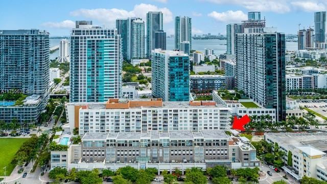 birds eye view of property with a city view
