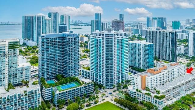 drone / aerial view featuring a city view