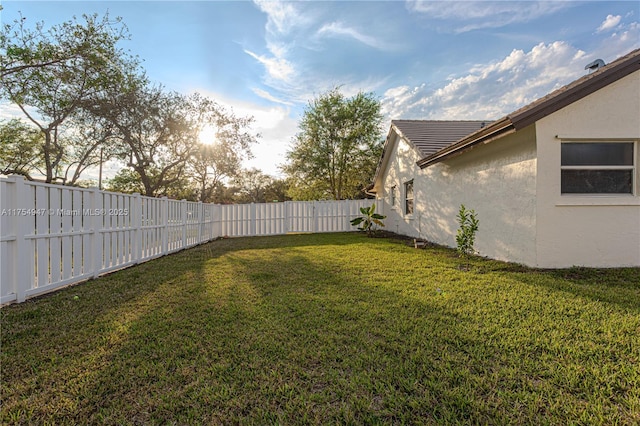 view of yard featuring a fenced backyard