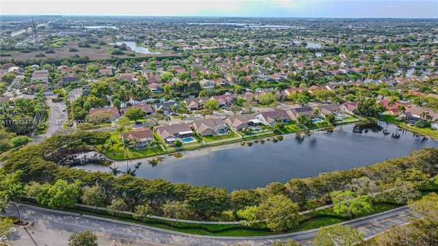 aerial view with a residential view and a water view