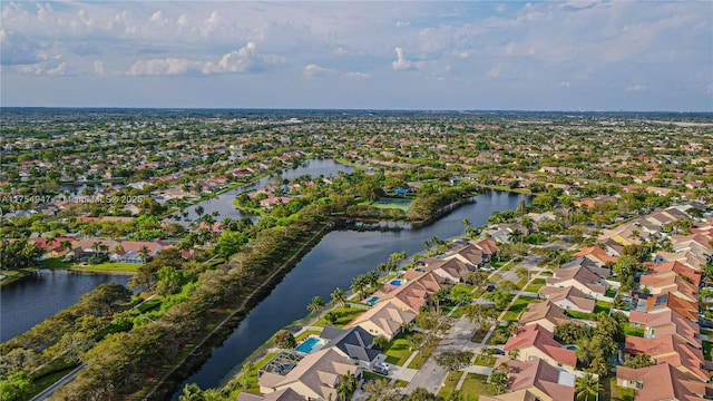 aerial view with a water view and a residential view