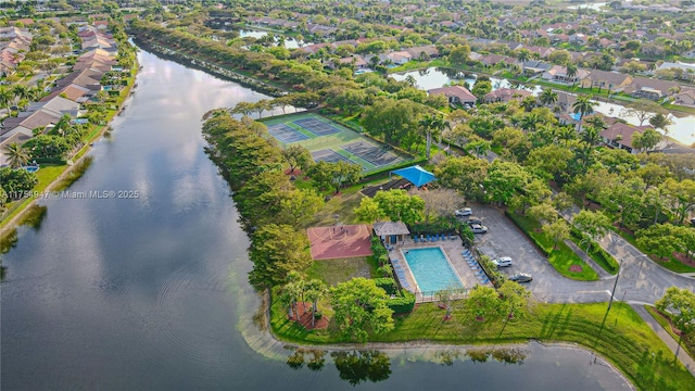 aerial view featuring a water view and a residential view