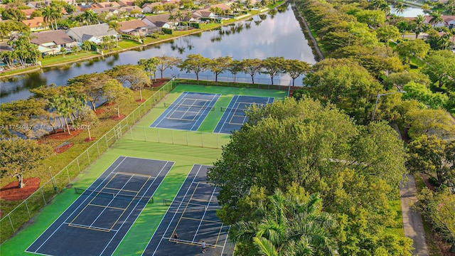 aerial view featuring a water view and a residential view