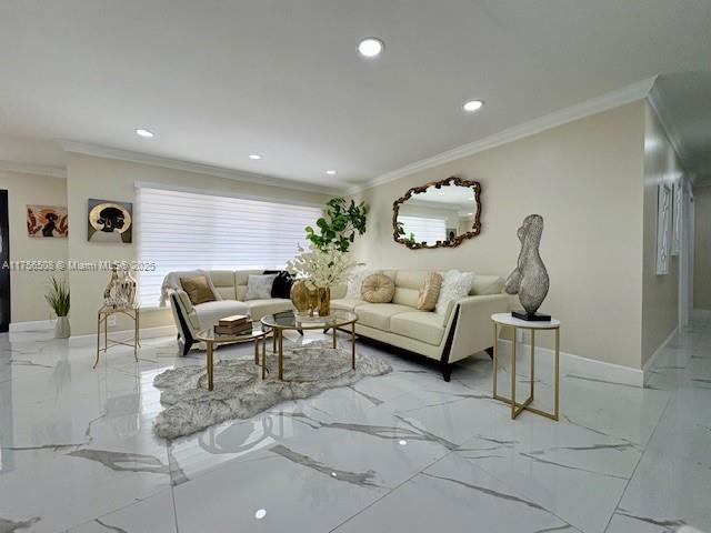 living room featuring marble finish floor, baseboards, ornamental molding, and recessed lighting