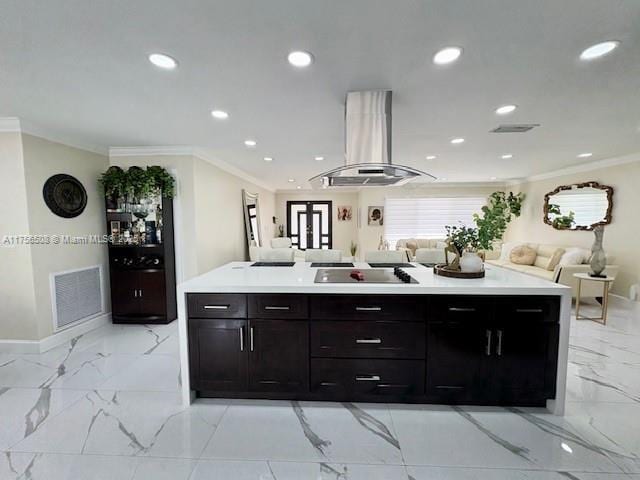 kitchen with crown molding, island exhaust hood, black electric stovetop, visible vents, and open floor plan