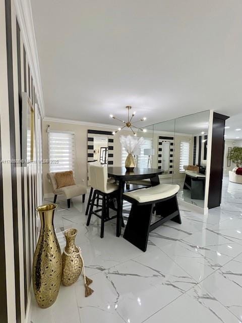 dining space featuring marble finish floor, ornamental molding, a healthy amount of sunlight, and an inviting chandelier