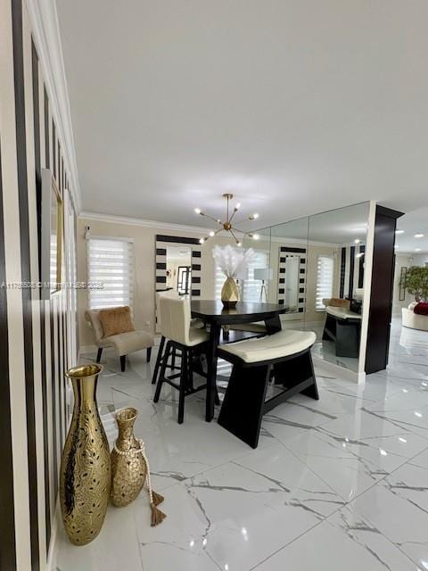 dining area with marble finish floor, ornamental molding, and a chandelier