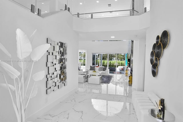 2578 NW 63rd Ln, Boca Raton, FL 33496 - entryway featuring marble finish floor and a high ceiling