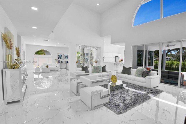2578 NW 63rd Ln, Boca Raton, FL 33496 - living area featuring recessed lighting, marble finish floor, and a towering ceiling