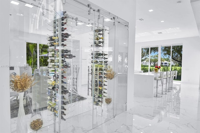 2578 NW 63rd Ln, Boca Raton, FL 33496 - wine room with marble finish floor and visible vents