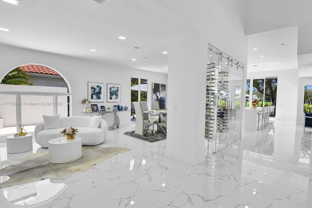 2578 NW 63rd Ln, Boca Raton, FL 33496 - living area with marble finish floor and recessed lighting