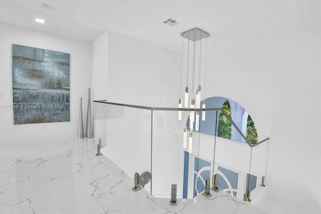 2578 NW 63rd Ln, Boca Raton, FL 33496 - corridor featuring marble finish floor and visible vents