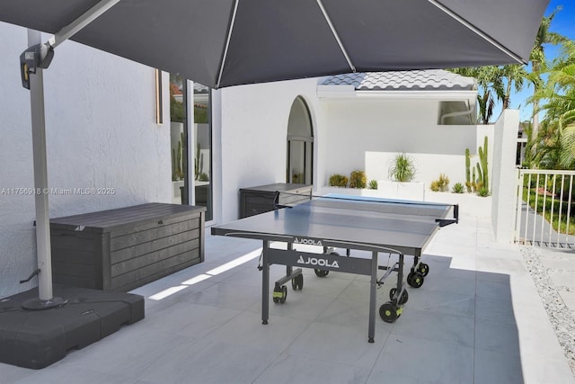 2578 NW 63rd Ln, Boca Raton, FL 33496 - view of patio / terrace featuring a jacuzzi and outdoor dining space