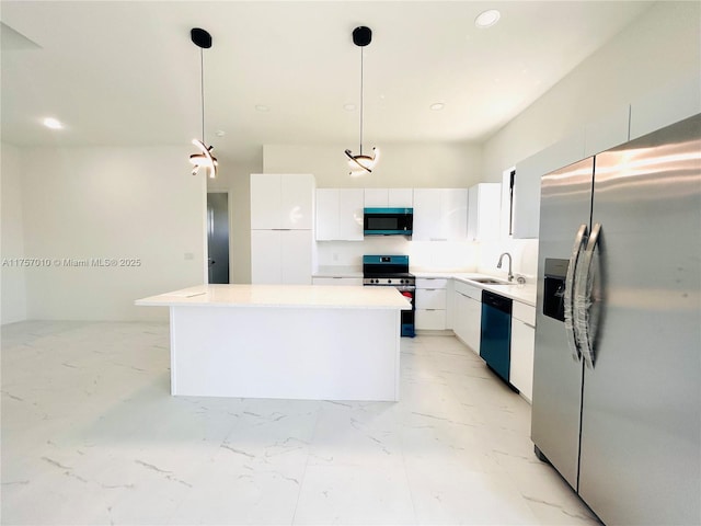 kitchen with stainless steel appliances, marble finish floor, white cabinetry, and a sink