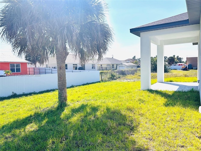 view of yard with fence