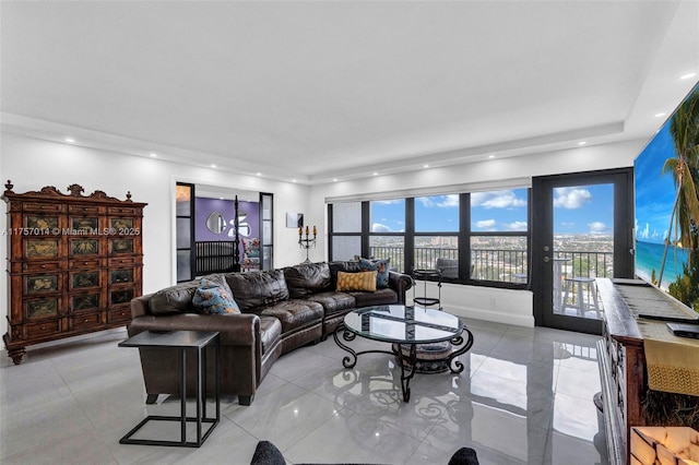 living area with light tile patterned flooring and recessed lighting