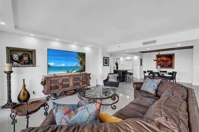 living room with visible vents and recessed lighting