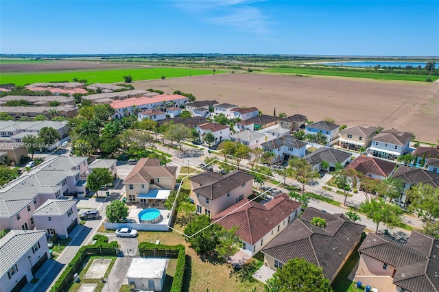 aerial view with a water view and a residential view