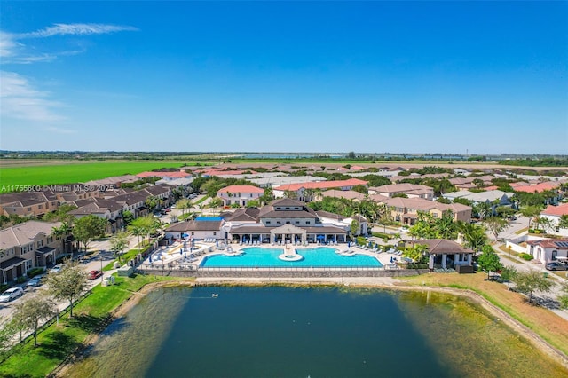 aerial view featuring a water view and a residential view