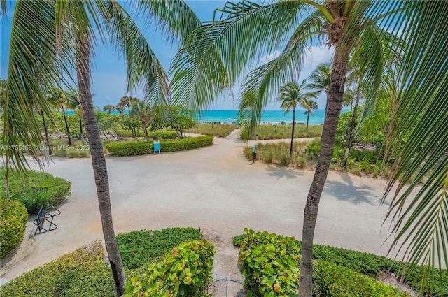 view of home's community with a view of the beach and a water view