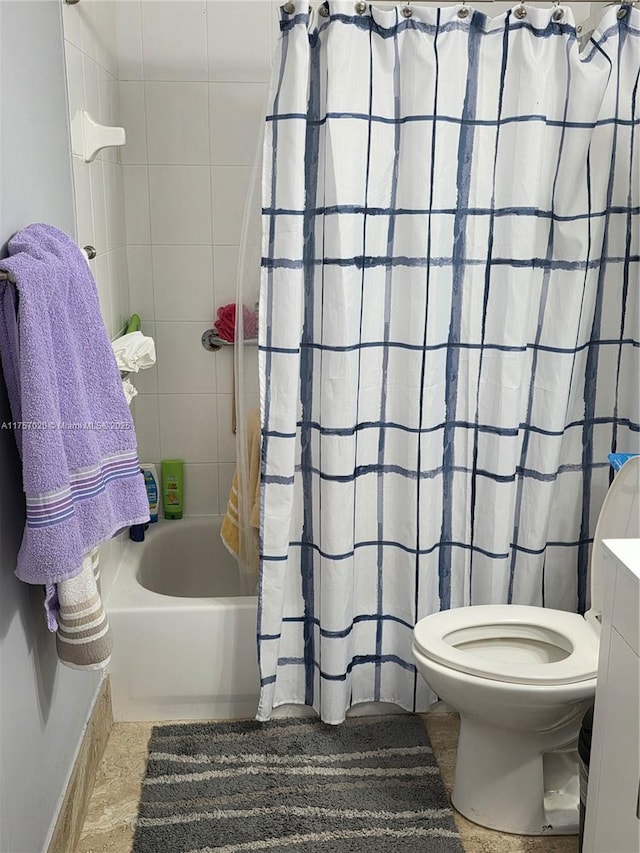 bathroom with toilet and shower / bathtub combination with curtain