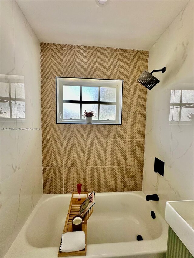 bathroom with shower / bath combination and vanity