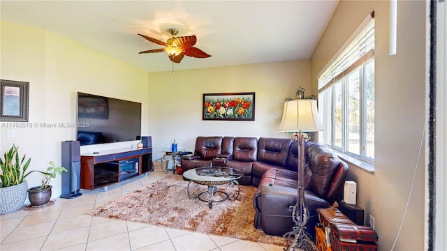 tiled living area featuring ceiling fan