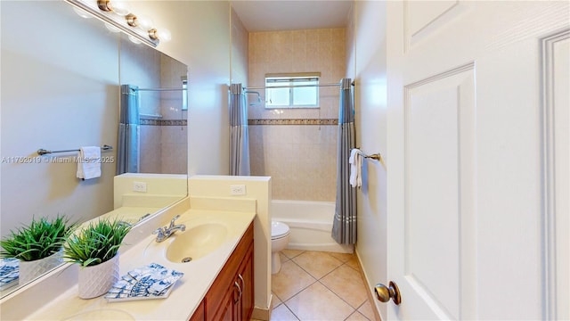 full bath featuring shower / bath combination with curtain, vanity, toilet, and tile patterned floors