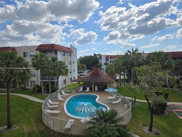 pool with a yard, a patio area, and a gazebo